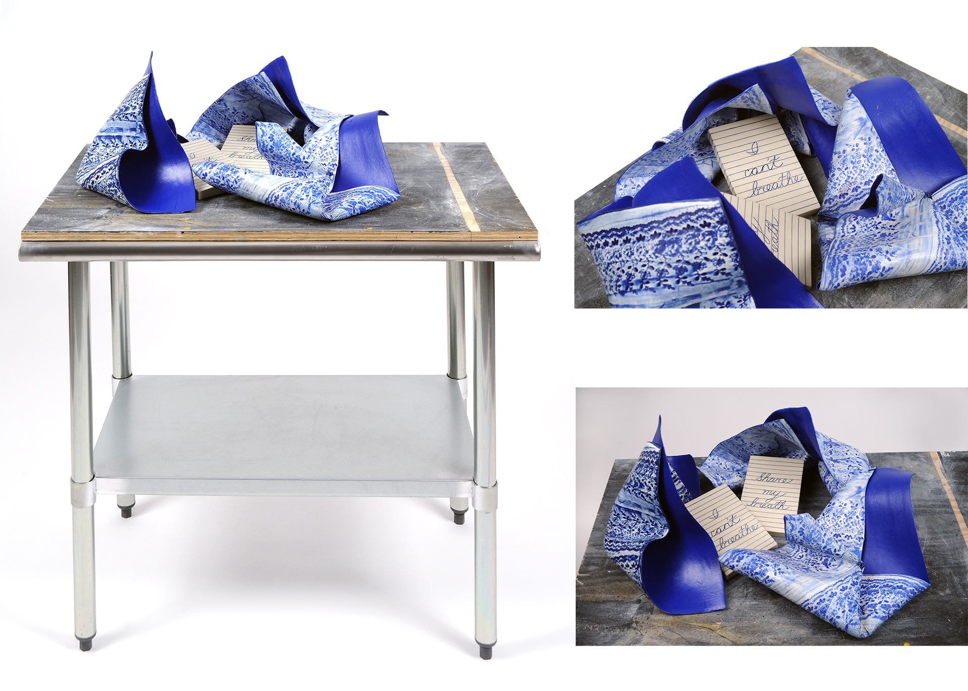 Elizabeth Vorlicek used stoneware, porcelain, cone 6 ox., a table, board and graphite to create a sculptural memorial to George Floyd, with text that reads, “I can’t breathe,” and “Share my breath”. 